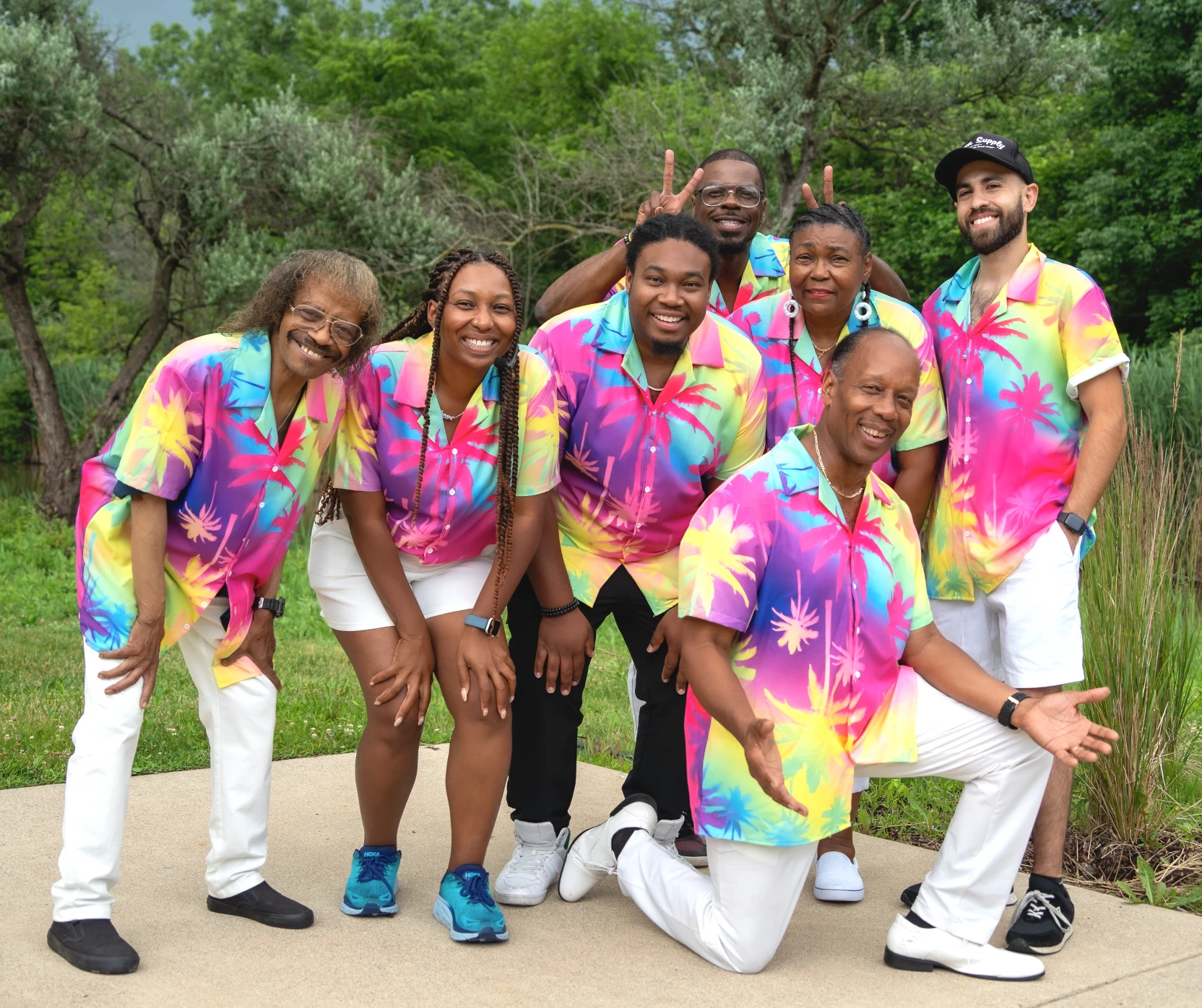 members of Gratitude Steel Band in colorful Hawaiian shirts smiling
